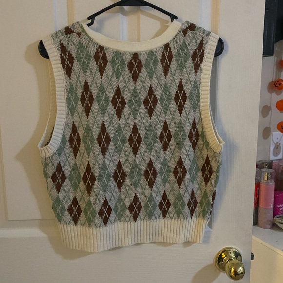 This is a sweater vest. Blue/green and brown colors from rue 21 - Picture 3 of 3
